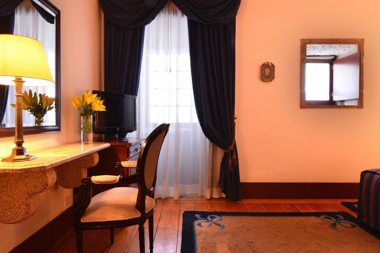 Pousada Mosteiro De Guimaraes Phòng bức ảnh A room at the hotel