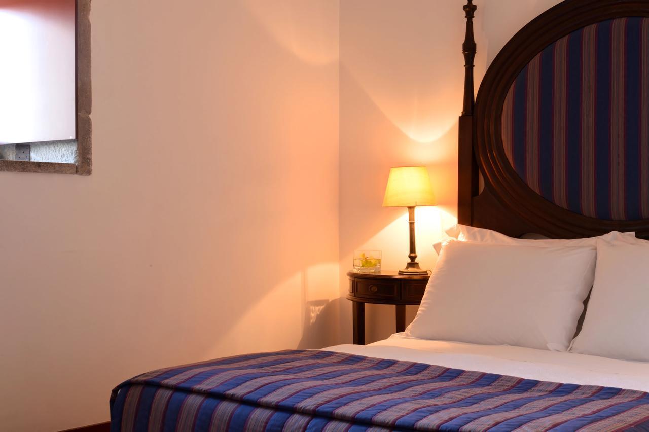 Pousada Mosteiro De Guimaraes Ngoại thất bức ảnh A bedroom at the hotel